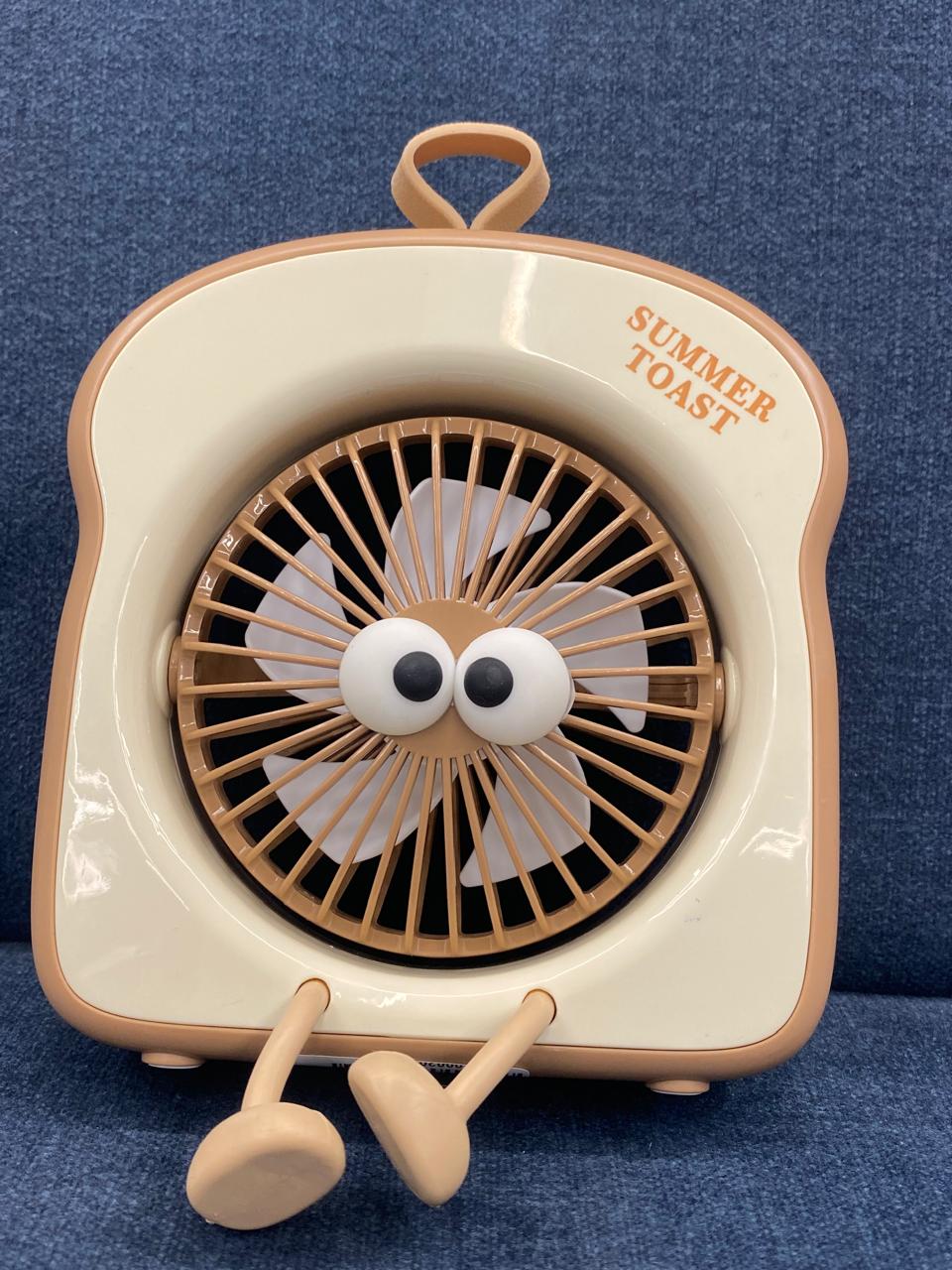 Toaster Fan The item in the image is a